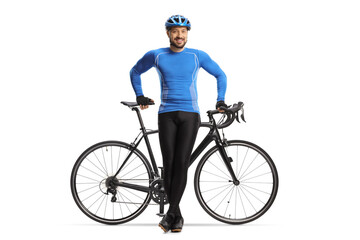 Obraz na płótnie Canvas Male cyclist sitting on a road bicycle and posing