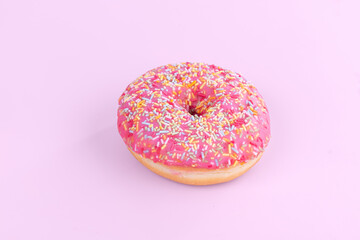 Pink donut with small candies
