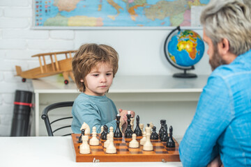 Games and activities for children. Family concept. Kids early development. Boy think or plan about chess game, vintage style for education concept.