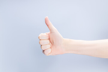 person showing thumb up gesture isolated. approval sign cut out