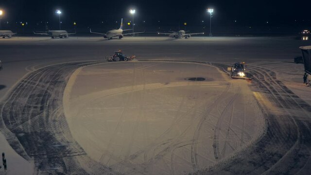 Snow removal weather airport city tractor machinery