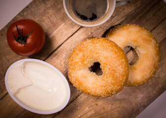 Breakfast table with coffee and bagels from above - food photography