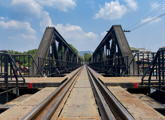 Fototapeta na wymiar Thai Railways crossing the River Kwai Iron Bridge Is a place to visit Kanchanaburi, Thailand.