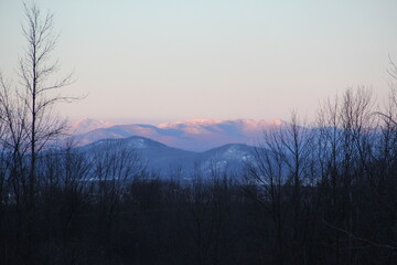 Fototapeta premium Sunrise over winter mountains