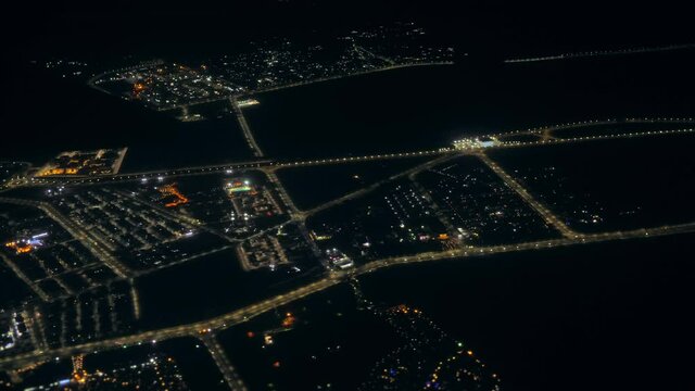Airplane city evening window illuminator aircraft travel toyrism