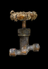 The old valve on a black background