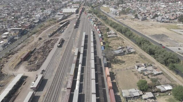 flying drone of colorful freight trains on the railway station.4k