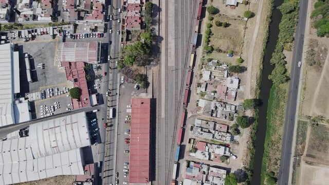 flying drone of colorful freight trains on the railway station.4k
