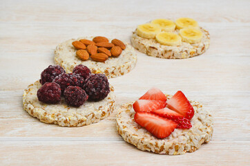 cereal breakfast crisp breads with strawberries, almonds nuts, banana fruit and blackberries