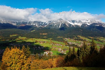 Fall scenery of Ellmau, a beautiful village in the grassy valley at the foothills of a majestic alpine mountain range ~ Magnificent autumn landscape of Wild Kaiser Mountains in Tirol, Austria, Europe