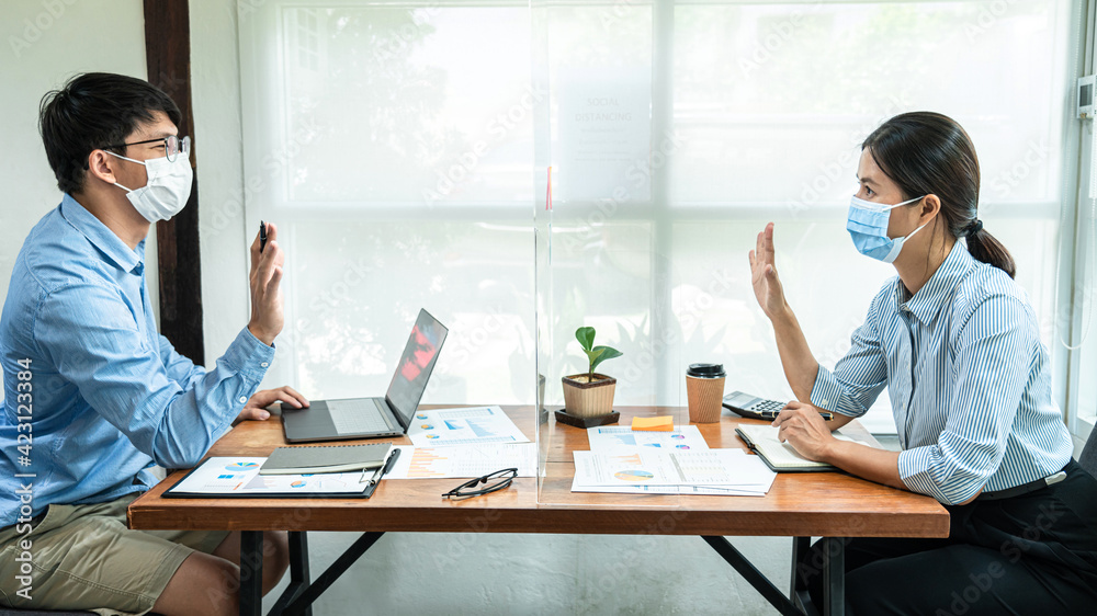 Poster two business colleagues wearing face mask to brainstorming business project and giving high five to 