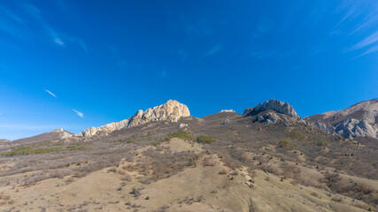 Coast of the Crimea peninsula, rocky mountains, aerial view of the sea resort of Koktebel