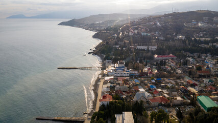 Coast of the Crimea peninsula, rocky mountains, aerial view Temple-lighthouse of St. Nicholas the Wonderworker (Russia, Malorechenskoye)
