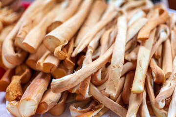 The central market of the city of MaikopSmoked cheese pigtail, Traditional Polish smoked cheese, Chechil cheese,