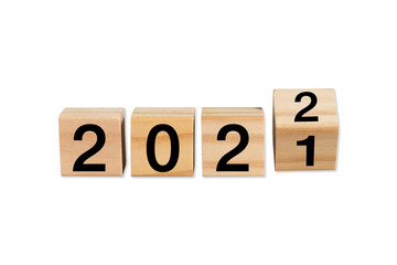 Four wood blocks with numbers 2021 to 2022 Isolated on white background. With clipping path.