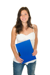 Portrait of a young smiling woman holding a blue binder in her hands, isolated on white studio background