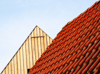 view alongside a tiled roof to a wooden gable