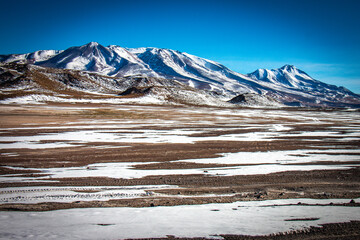 volcanic landscape in bolivia, altiplano, snow