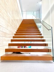 Iron stairs decorated with teak in the city