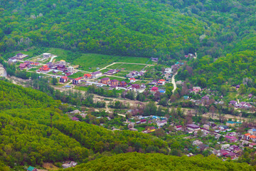 Aerial landscape, view of the small town in mountain valley