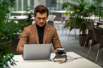 businessman sitting at the table