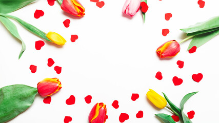 St. Valentine or Mother's Day. Frame with flowers and tulip. Easter, spring concept. Flat lay, top view