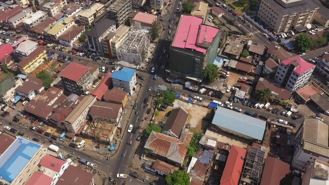 Aerial downtown Freetown Sierra Leone Africa circle part 3. Sierra Leone on the coast of west Africa is a nation that suffers with extreme poverty and hunger. Congested crowded homes and businesses.