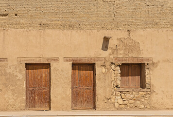 Old wooden doorways in abandoned egyptian house