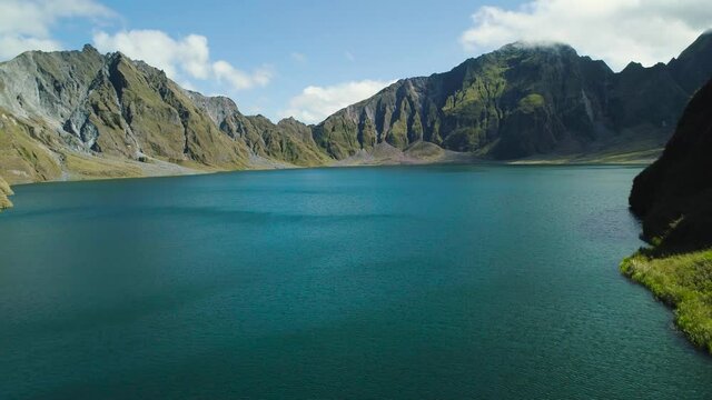 Crater lake of the volcano Pinatubo among the mountains, Philippines, Luzon. Aerial view beautiful landscape at Pinatubo mountain crater lake. Travel concept