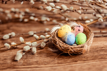 Christian holiday. A painted quail egg lies in the nest. 