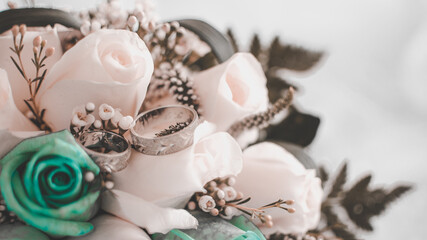 Fototapeta na wymiar Bridal bouquet with rings, earrings, accessories and shoes, wedding concept