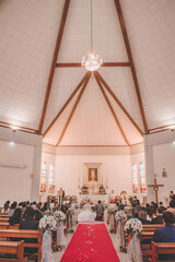 wedding dress decorated with shoes and bouquet