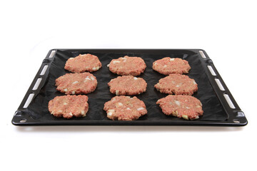 raw burger meat prepared for grill