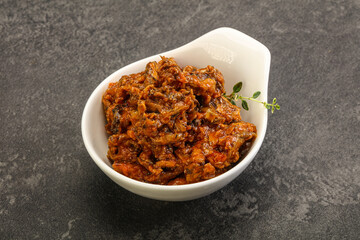 Canned anchovy in tomato sauce