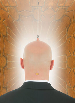 Businessman with antenna and computer chip in head
