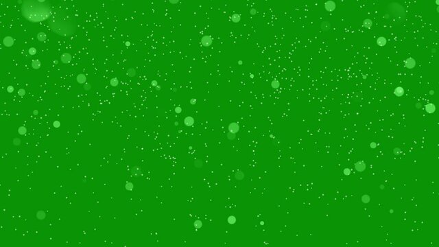 Snowfall and bokeh lights motion graphics with green screen background