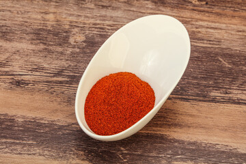 Dry paprika powder in the bowl