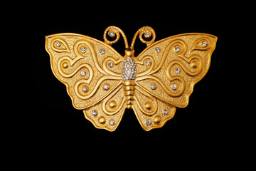 Vintage gold butterfly belt buckle from the 80s with rhinestone inlaid on it