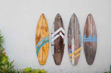 Vintage surfboard made by wood hanging on the wall -  Retro, Vintage decoration concept