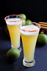 Indian traditional sweet green mango juice. Also known as Aam Panna, Ambyache Panha. Summer Refreshing drink made with raw mangos, jaggery, and salt. Recipe ingredients with copy space.