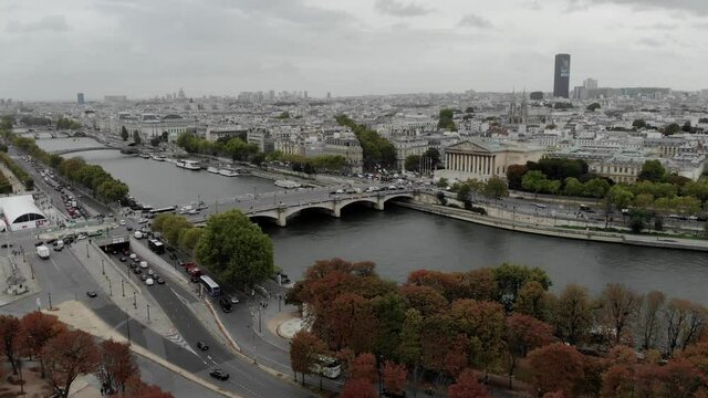Place de la Concorde in Paris overlooking the public park le jardin des Tuileries and the river Seine from a drone