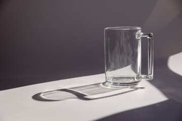 transparent glass on a white background with shadows