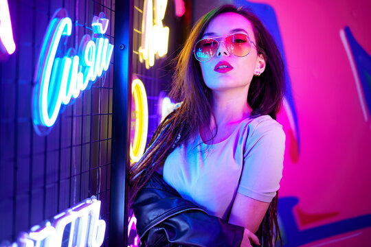 Premium Photo  Photo of Slim Female Model With Neon Lit Bodysuit