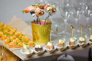 Catering service. Snacks for guests on the table.