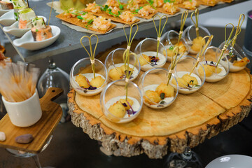 Catering service. Snacks for guests on the table.