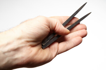 Styles of grip for single blade shuriken throwing weapons - detail of hand grip