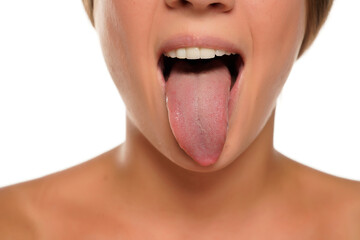 young woman sticking out her tongue