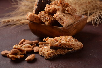 Various healthy granola bars (muesli or cereal bars). Set of energy, sport, breakfast and protein bars. Puffed rice, berries, chocolate, oatmeal, almond and honey cereal bars.