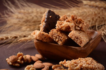 Various healthy granola bars (muesli or cereal bars). Set of energy, sport, breakfast and protein bars. Puffed rice, berries, chocolate, oatmeal, almond and honey cereal bars.