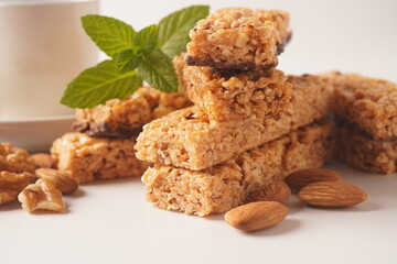 Various healthy granola bars (muesli or cereal bars). Set of energy, sport, breakfast and protein bars. Puffed rice, berries, chocolate, oatmeal, almond and honey cereal bars.